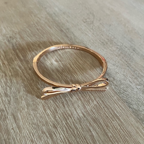kate spade Jewelry - kate spade Skinny Mini Bow Bangle in Rose Gold